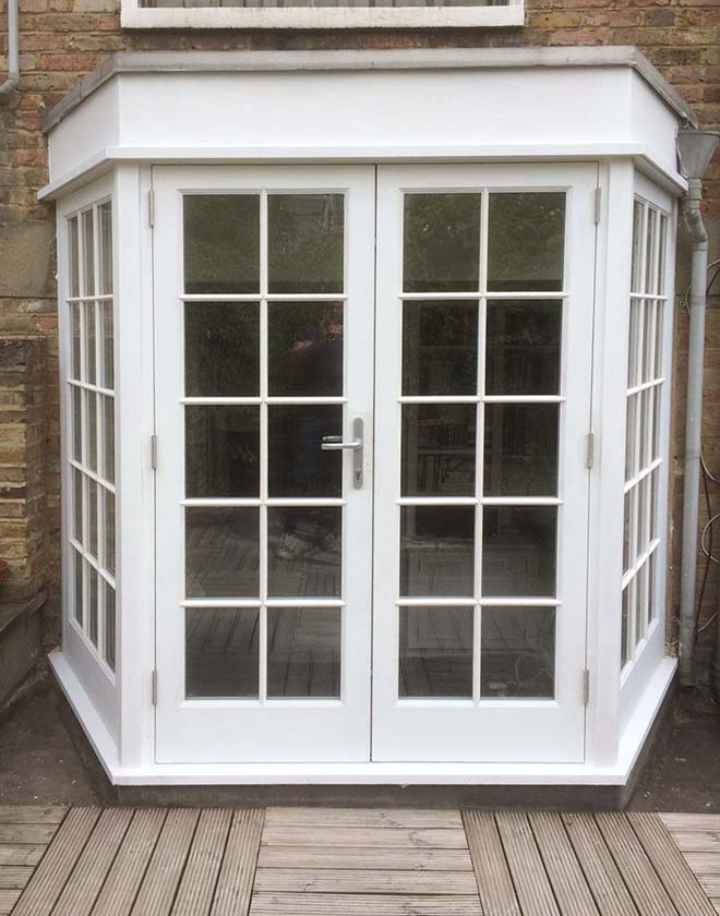 French doors with side panels forming a bay area, Camden