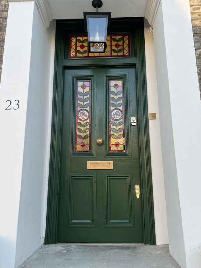 Replica door containing original glass