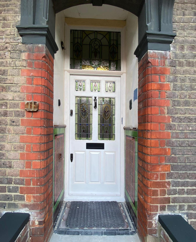 Re-fit taking stained glass from the orginal door and re-setting in exact replica, Hampstead